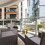 Sunlit Urban Escape with Balcony by Sea N Rent