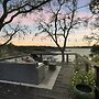 Lakefront On Lake Travis 4 Bedroom Residence by RedAwning