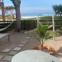 Pé na areia.