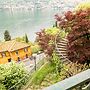 JOIVY Garden Oasis: 1BR Apt w/ Balcony & Parking