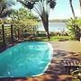 Casa de Temporada 4 Coqueiros, 16 Hóspedes, Piscina, 4 Suítes e Churra