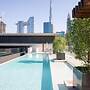Aya - Impeccable 1BR Apartment with Balcony in City Walk