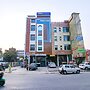 Fabhotel Palm Plaza