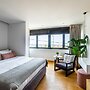 Earth Boutique Apartments Next to Stavros Niarchos