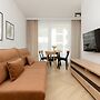 Łopuszańska Apartment Warsaw by Renters