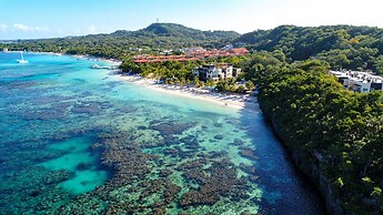 ホンジュラスのロアタンにあるgrand Roatan Caribbean Resort 最低料金を保証します