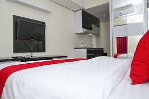 Hotel Reddoorz Apartment At Tamansari Panoramic Soekarno - 