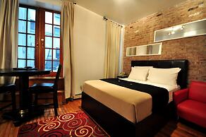 Off Soho Suites Hotel