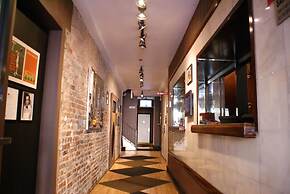 Off Soho Suites Hotel