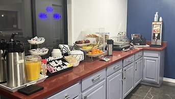 Xecutive Inn and Suites