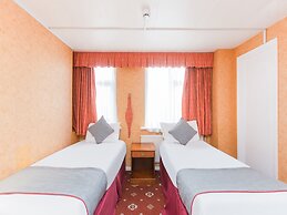 OYO Stade Court Hotel