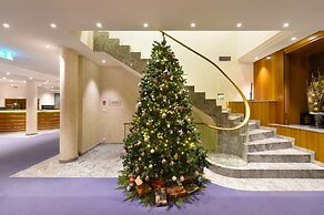 Glärnischhof by Trinity