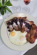 Rogue Regency Inn and Suites