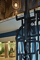 De Bonart Naples, Curio Collection by Hilton