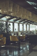 De Bonart Naples, Curio Collection by Hilton