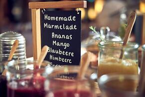 Wasserturm Hotel Cologne, Curio Collection by Hilton