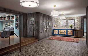 Graduate by Hilton State College