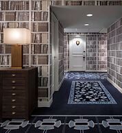 Graduate by Hilton State College