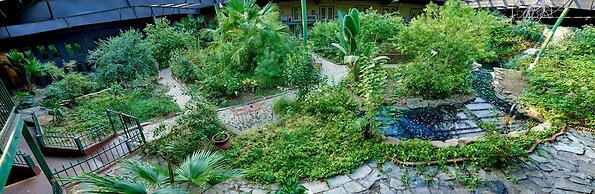 Family Garden Inn & Suites