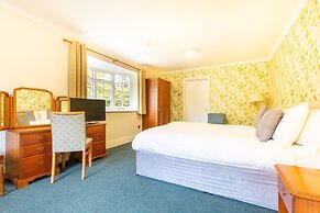 Woodland Manor Hotel
