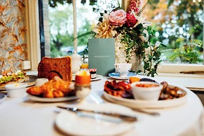 Woodland Manor Hotel