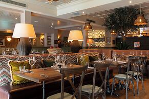 The Potter's Heron - A Heartwood Inn