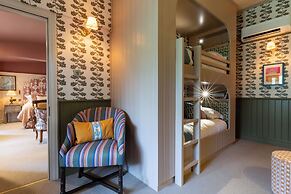 The Potter's Heron - A Heartwood Inn