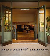The Potter's Heron - A Heartwood Inn