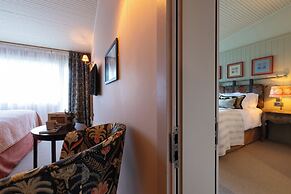 The Potter's Heron - A Heartwood Inn