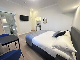 Puffers Inn Logan Motel