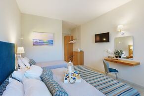 Dolphin Bay Seaside Resort & Suites