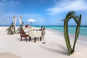 Taj Coral Reef Resort & Spa Maldives – A Premium All Inclusive Resort