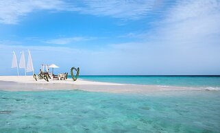 Taj Coral Reef Resort & Spa Maldives – A Premium All Inclusive Resort