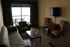 Holiday Suites Hotel And Beach