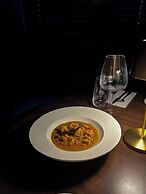 Nomi Rooms and Restaurant