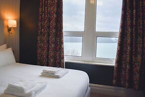 Nomi Rooms and Restaurant