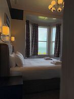 Nomi Rooms and Restaurant
