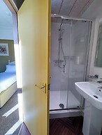 Nomi Rooms and Restaurant