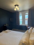 Nomi Rooms and Restaurant