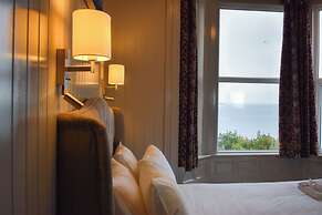 Nomi Rooms and Restaurant