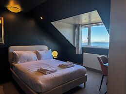 Nomi Rooms and Restaurant