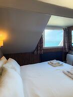Nomi Rooms and Restaurant