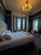 Nomi Rooms and Restaurant