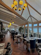 Nomi Rooms and Restaurant