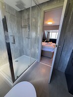 Nomi Rooms and Restaurant