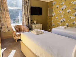 Nomi Rooms and Restaurant