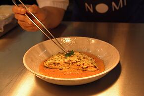Nomi Rooms and Restaurant