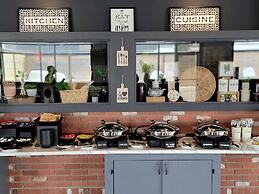 Merit Hotel & Suites