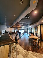 Merit Hotel & Suites