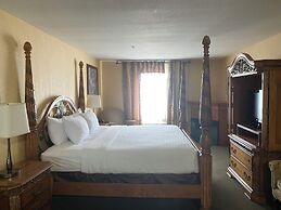 Merit Hotel & Suites